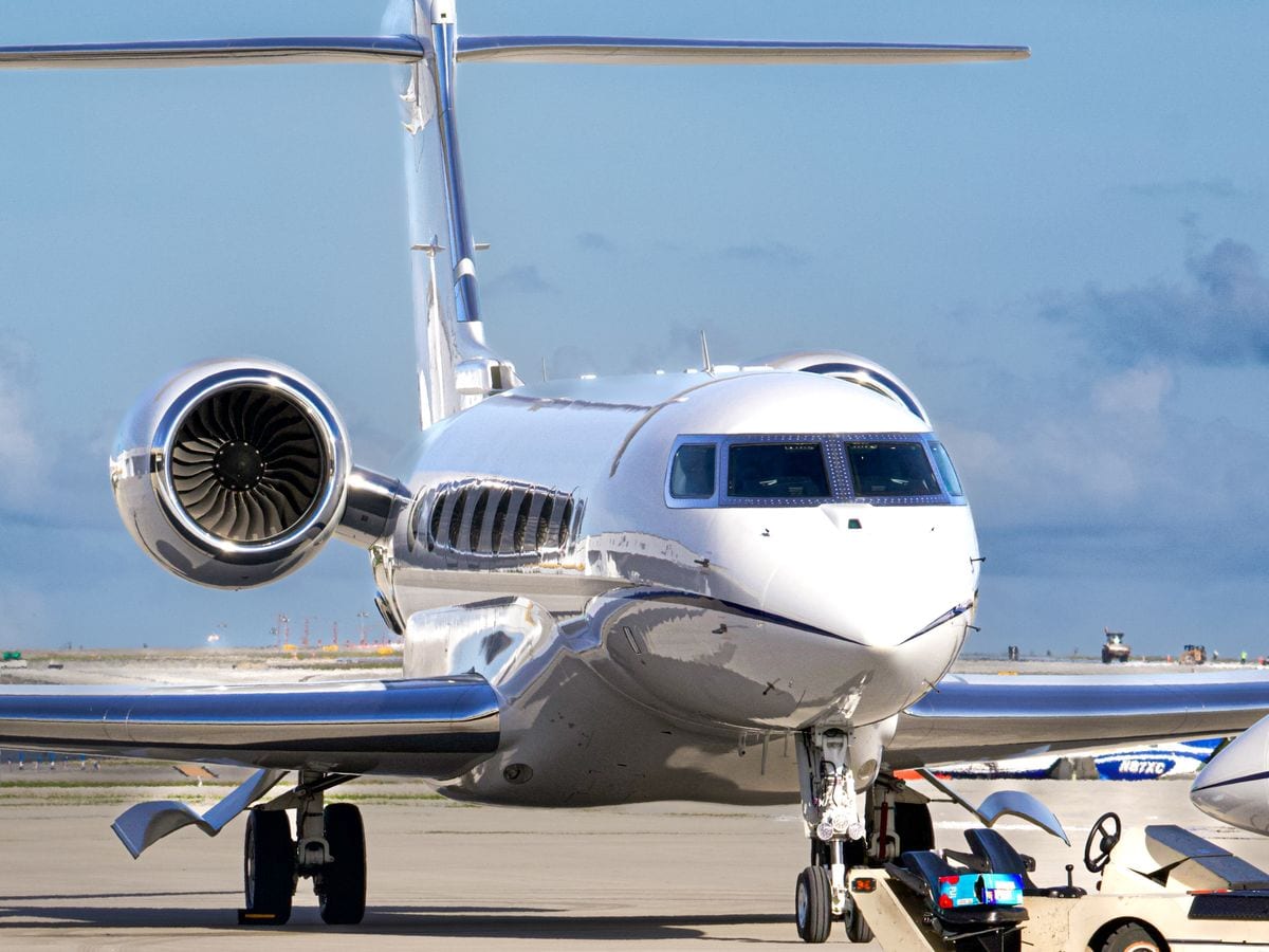 A polished business jet on the apron