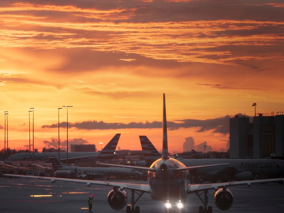 Aircraft on the tarmac at sunset
